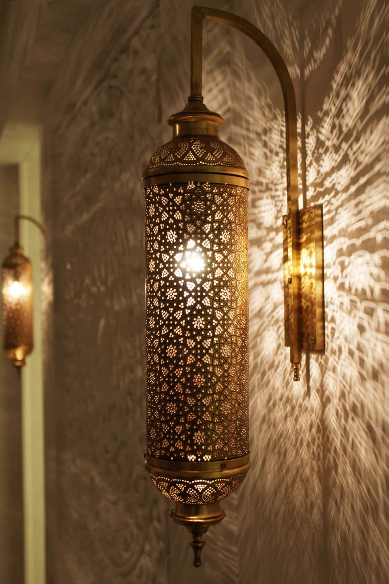Cylindrical brass wall light